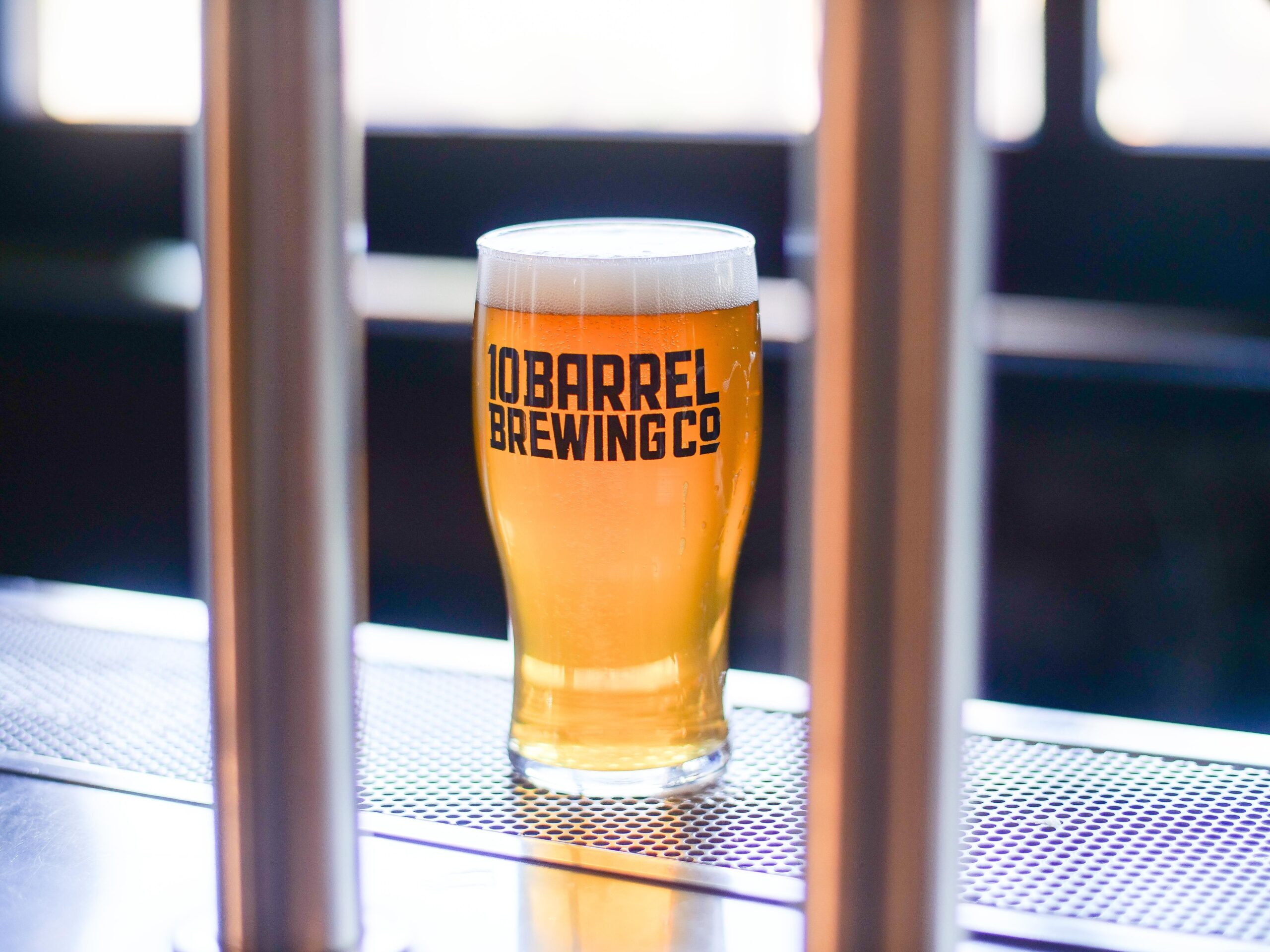 Pint of amber pale ale at a brewery